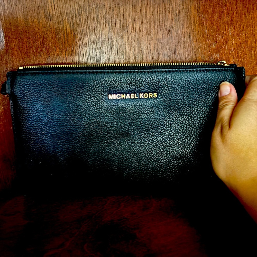Michael Kors black wristlet in excellent condition